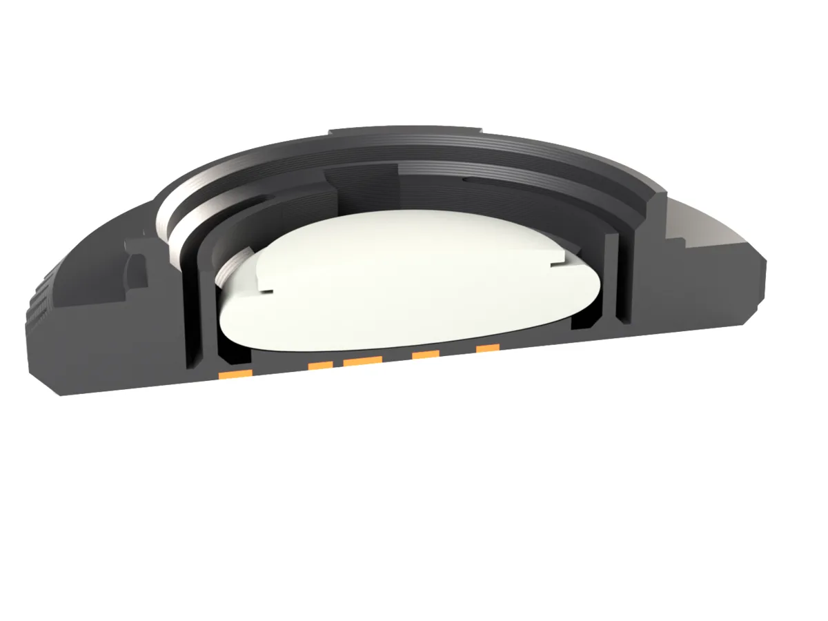 Cut through the Sony E AirTag body cap: the AirTag held by the snap ring behind the face