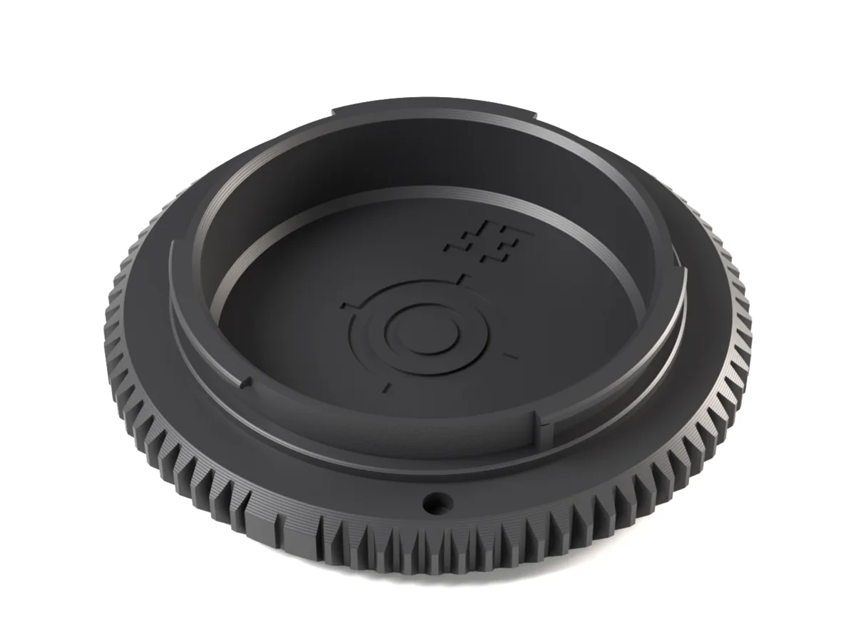 Canon EF / EF-S body cap, 3D printed, seen from the camera side with its bayonet lugs and locking pin hole