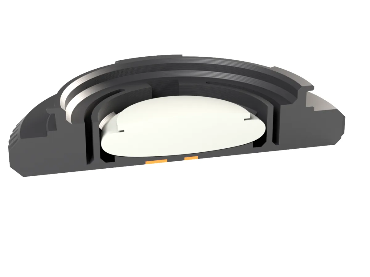 Cut through the L-Mount AirTag body cap: the AirTag held by the snap ring behind the face