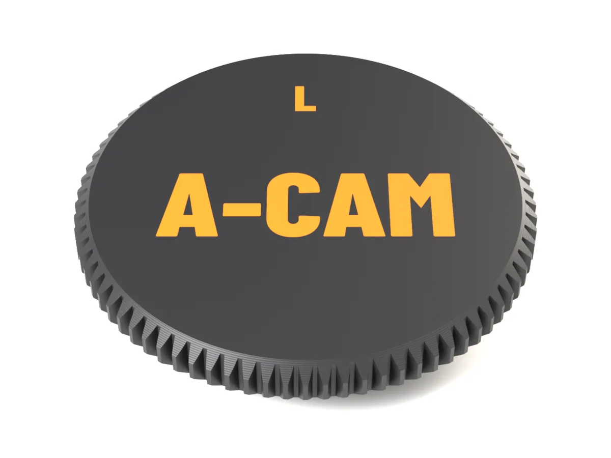Face of the L-Mount AirTag body cap with A-CAM and L as a two-colour inlay