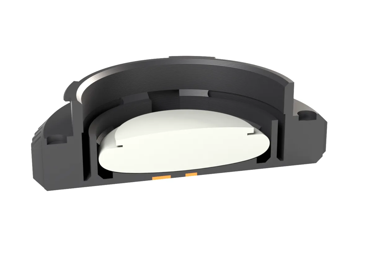 Cut through the Leica M AirTag body cap: the AirTag held by the snap ring behind the face