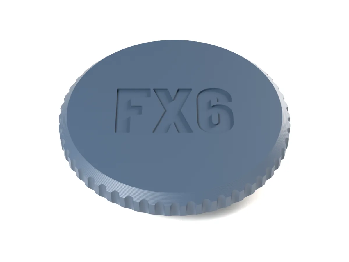 Micro Four Thirds body cap with the flutes grip and FX6 engraved into the face for one filament