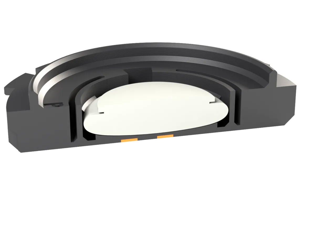 Cut through the ARRI PL AirTag body cap: the AirTag held by the snap ring behind the face