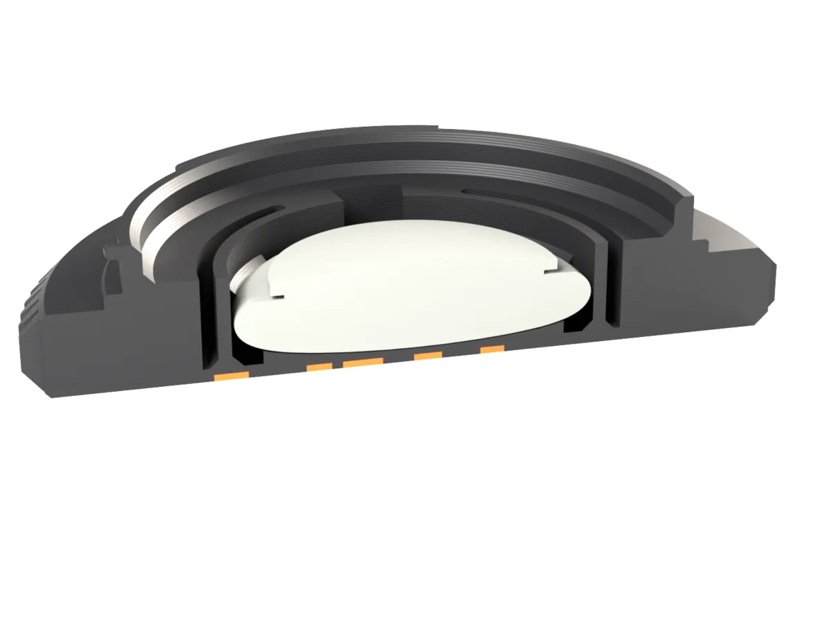 Cut through the Canon RF AirTag body cap: the AirTag held by the snap ring behind the face