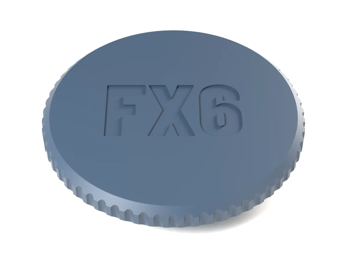 Canon RF body cap with the flutes grip and FX6 engraved into the face for one filament