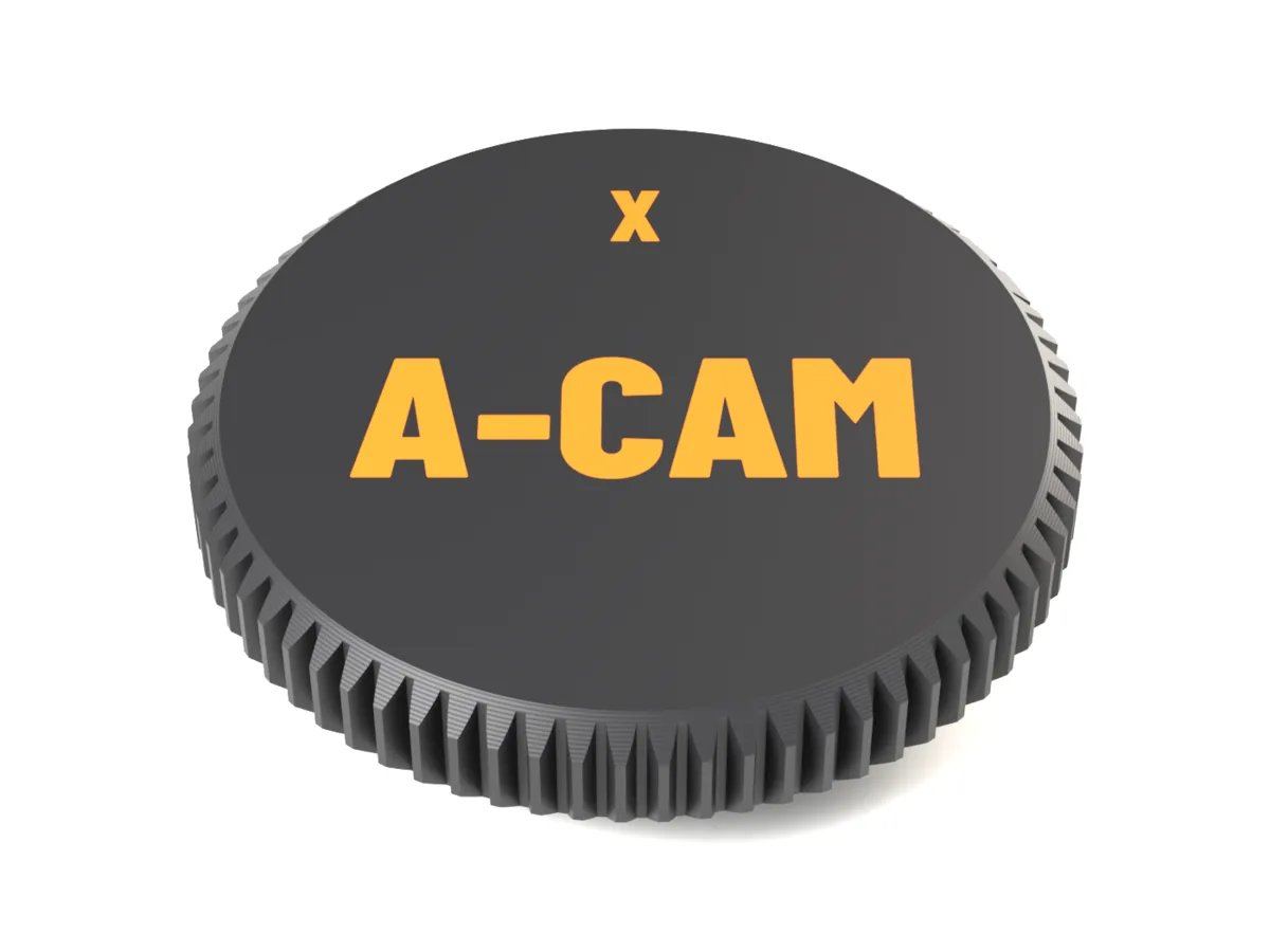 Face of the Fujifilm X AirTag body cap with A-CAM and X as a two-colour inlay