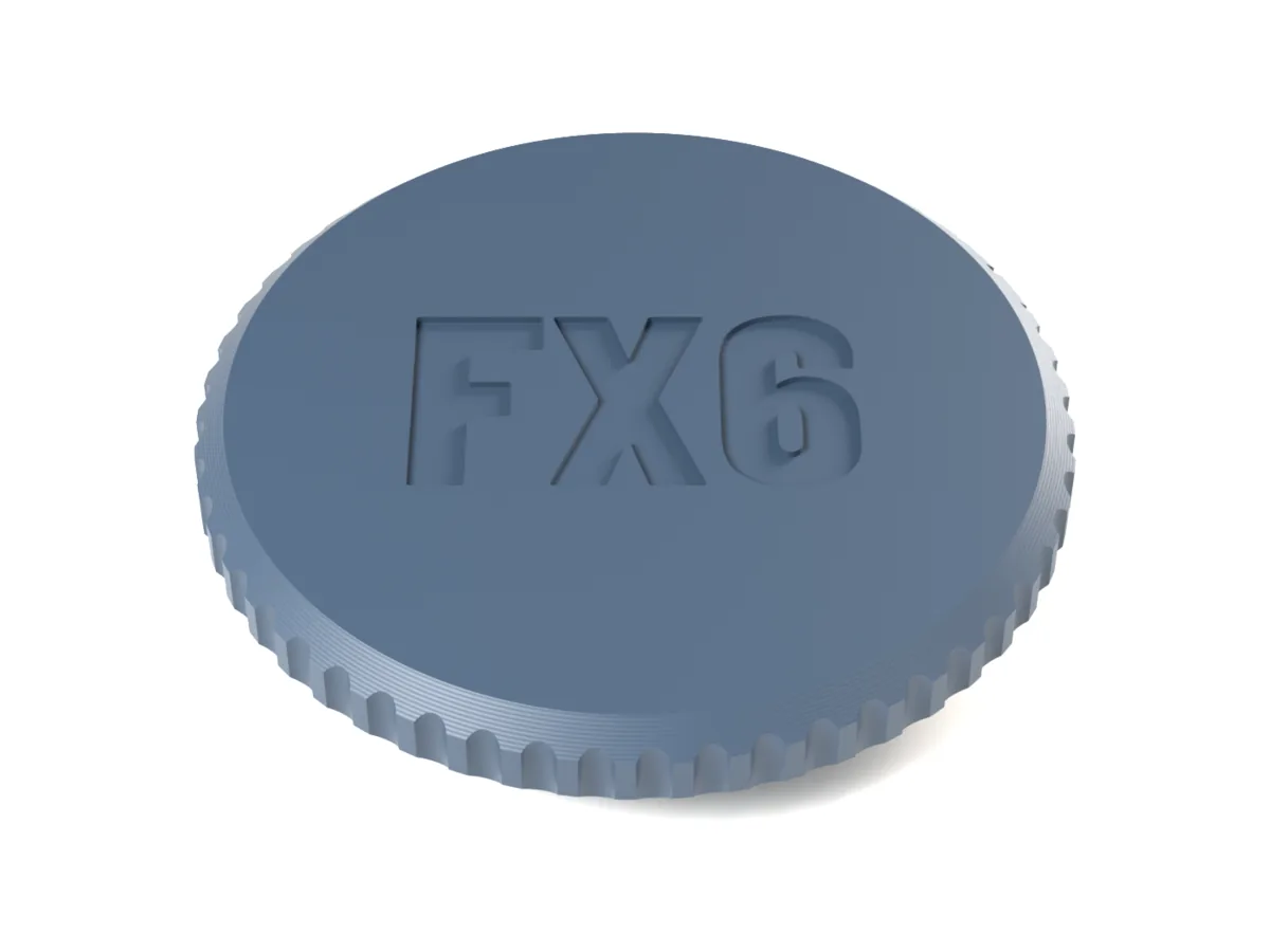 Fujifilm X body cap with the flutes grip and FX6 engraved into the face for one filament