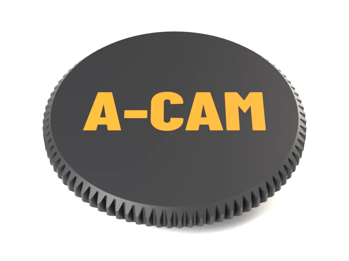 Face of the Nikon Z body cap with A-CAM as a flush two-colour inlay