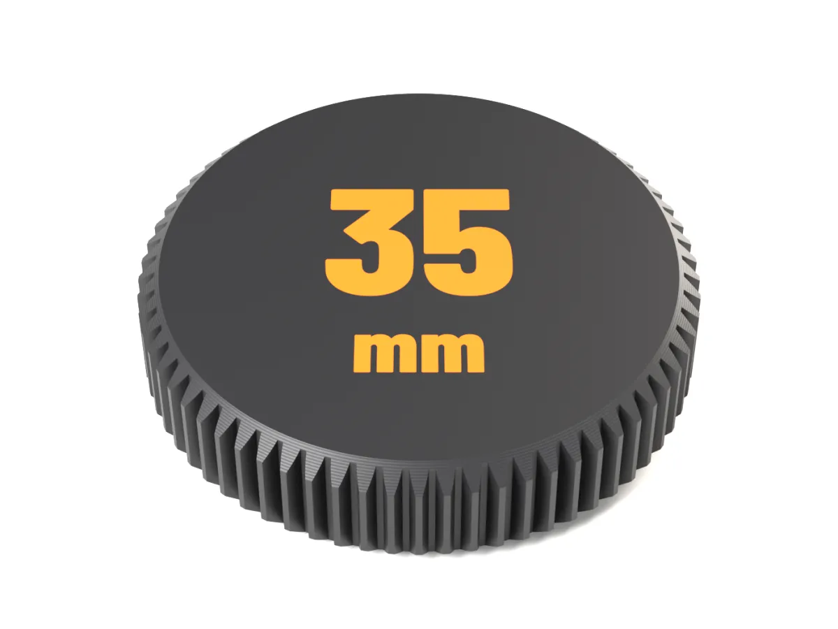 Face of the Sony E rear cap with 35 mm as a two-colour inlay
