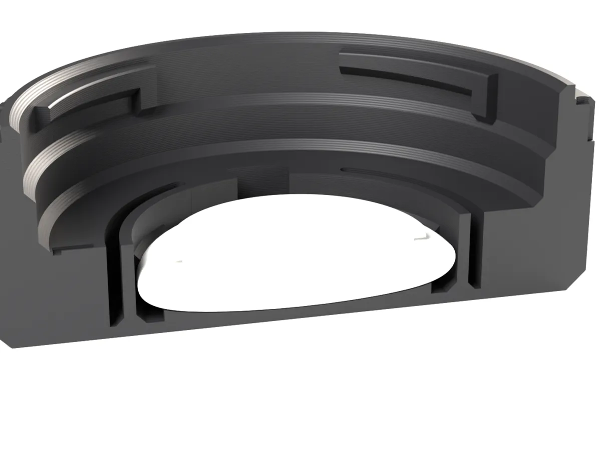 Cut through the L-Mount AirTag rear cap: the AirTag held by the snap ring below the lens room