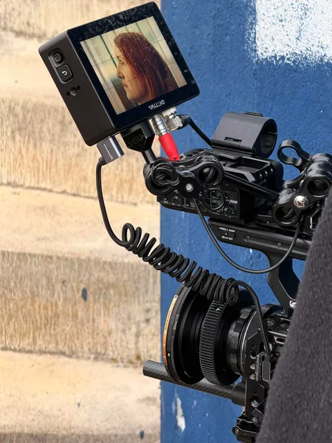 A printed focus ring on the lens of a camera rig on set
